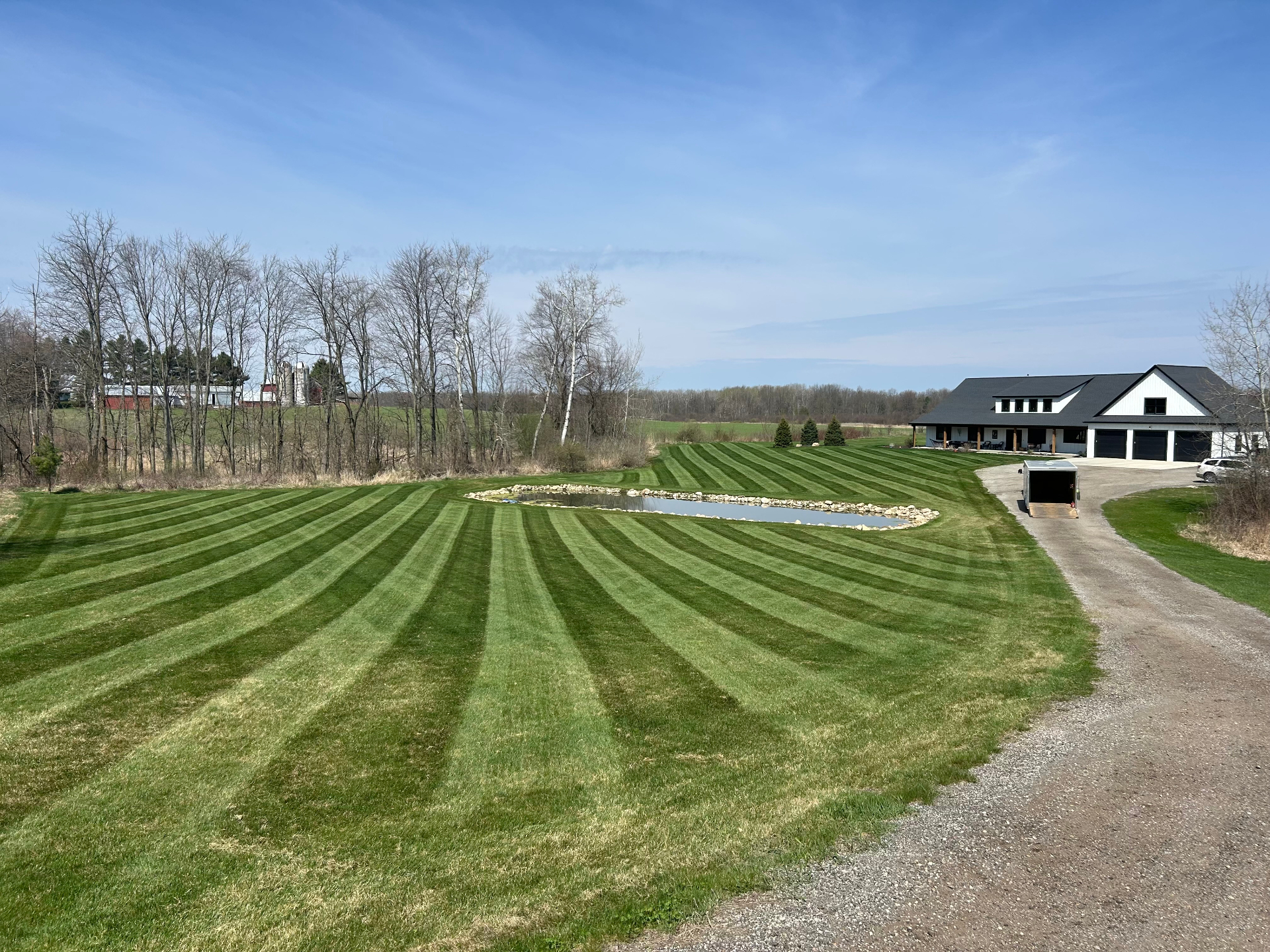 Freshly striped emerald lawn at dusk